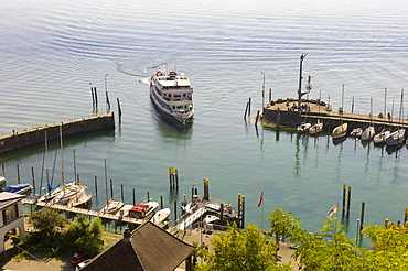 Pleasure boat enters the port of Meersburg, Meersburg, Baden-Wurttemberg, Germany, Europe