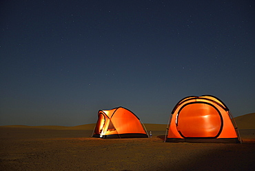 Tents in the Nubian Desert in the evening light, near Dongola, Northern State, Nubia, Sudan, Africa