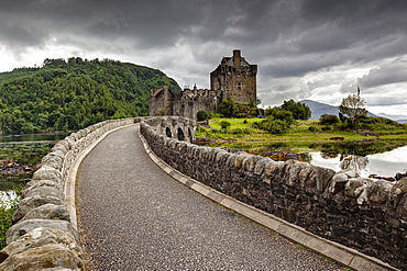 Eilean Donan Castle at the confluence of Loch Duich, Loch Alsh and Loch Long, Scottish Highlands, Dornie, Scotland, United Kingdom, Europe