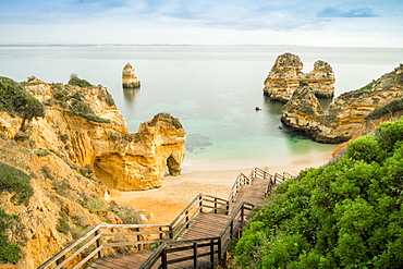 Camilo Beach with wooden walkway to beach, Lagos, Algarve, Portugal, Europe