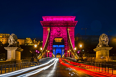 Illuminated chain bridge with traces of light at night, Budapest, Hungary, Europe