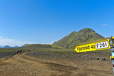 Wild gravel road with a traffic sign to Fljotshlio, Laugavegur trekking route, near Hvanngil, Highlands, Suourland, Iceland, Europe