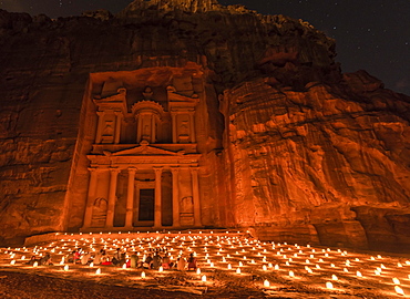 Candles in front of the Pharaoh's treasure house, struck in rock, at night, facade of the treasure house Al-Khazneh, Khazne Faraun, mausoleum in the Nabataean city Petra, near Wadi Musa, Jordan, Asia