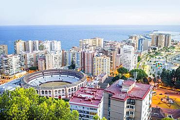 Malaga bullring surrounded by residential buildings next to the sea, Malaga, Spain, Europe