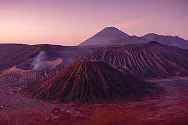 Volcanic pipes with smoking volcano Gunung Bromo, Mt. Batok, Mt. Kursi, Mt. Gunung Semeru, National Park Bromo-Tengger-Semeru, Java, Indonesia, Asia