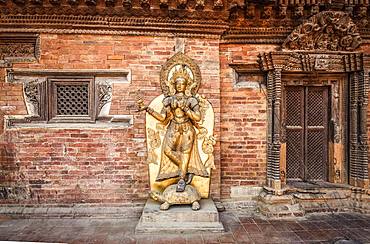 Buddhist deity, golden statue, temple, Patan, Kathmandu valley, Himalaya region, Nepal, Asia