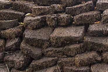 Stacked cut peat in raised bog, Durness, Scottish Highlands, Scotland, Great Britain