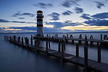 Lighthouse at the footbridge at dusk, Podersdorf, Burgenland, Austria, Europe