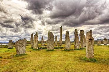 Megalith Stone Formation Callanish Standing Stones, Stone Circle under a Cloudy Sky, Lewis and Harris Island, Outer Hebrides, Scotland, United Kingdom, Europe