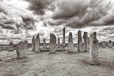 Megalith Stone Formation Callanish Standing Stones, Stone Circle under a Cloudy Sky, Lewis and Harris Island, Outer Hebrides, Scotland, United Kingdom, Europe