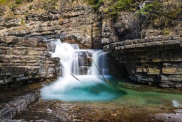 Waterfall at a mountain river, Johnston Creek in Johnston Canyon, Bow Valley, Banff National Park, Rocky Mountains, Alberta, Canada, North America