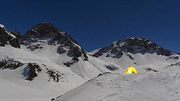 Illuminated tent in the snow on the Maedelejoch, night shot, near Kemptner hut, Allgaeu Alps, Tyrol, Austria, Europe