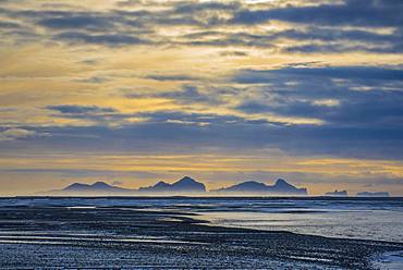 View from the mainland to the Westman Islands with cloudy sky, Vestmannaeyjar, Sudurland, Iceland, Europe