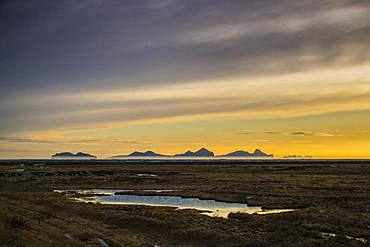 View from the mainland to the Westman Islands at sunset, Vestmannaeyjar, Sudurland, Iceland, Europe