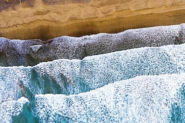 Waves running out at sandy beach, Playa Famara near Caleta de Famara, drone shot, Lanzarote, Canary Islands, Spain, Europe