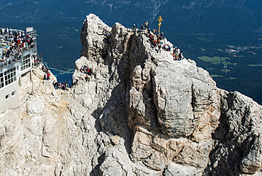 Tourism at the summit of the Zugspitze with summit cross, Wetterstein range, Garmisch-Partenkirchen, Bavaria, Upper Bavaria, Germany, Europe