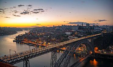 View over Porto with river Rio Douro and bridge Ponte Dom Luis I, Sunset, Porto, Portugal, Europe