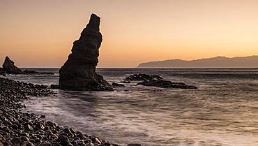 Beach Playa de Caleta with striking rocks and stones at sunrise, Playa de Caleta, La Gomera, Canary Islands, Spain, Europe