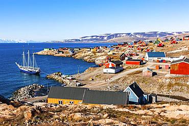 East Greenland town Ittoqqortoormiit with view to the harbour with sailboat, Scoresbysund, East Greenland, Greenland, North America