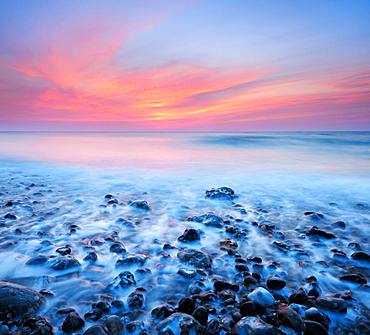 Sunset, sunset by the sea, stones in the surf, English Channel, Saint-Martin-aux-Buneaux, Normandy, France, Europe