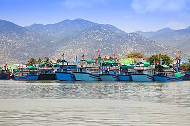 Vietnamese fishing boats in port near Cana, South China Sea, Vietnam, Asia