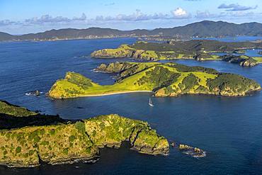 Aerial view of the Bay of Islands with islands and sailboat, Far North District, North Island, New Zealand, Oceania