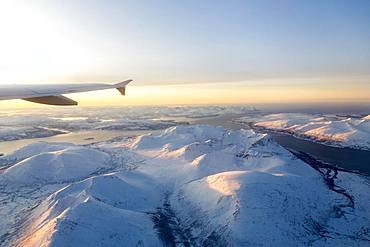 Aerial view, snow-covered mountains with fjord, province Tromsoe, Tromsoe, Norway, Europe