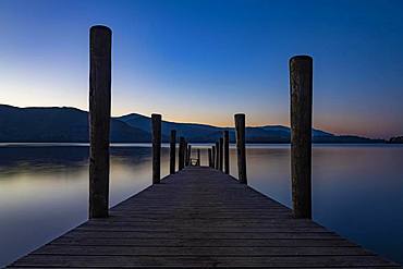 Lake Derwentwater with jetty at sunset, Keswick, Yorkshire Dales National Park, Central England, Great Britain