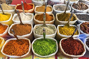 Spices, herbs and curry powders on display at Anjuna Beach Flea Market, Goa, India, Asia