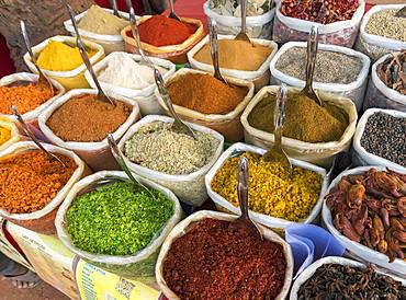 Sacks of spices, herbs and curry powders on display at Anjuna Beach Flea Market, Goa, India, Asia