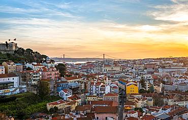 City view, view over Lisbon with Castelo de Sao Jorge and Ponte 25 de Abril at sunset, viewpoint Graca, Lisbon, Portugal, Europe