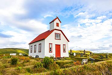 Small church with red roof and cemetery, South Iceland, Iceland, Europe