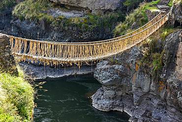 Suspension bridge Q'iswachaka from the Inca era, rope bridge of braided Ichu grass (Jarava ichu) over Rio Apurimac, Canas province, Peru, South America