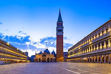 St. Mark's Square in the morning with the bell tower of Campanile and the Basilica of St. Mark, San Marco, Venice, Veneto, Italy, Europe