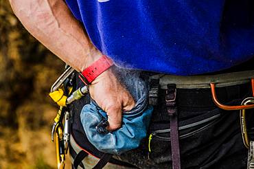 Detail, Climber with hand in magnesium bag, Portugal, Europe