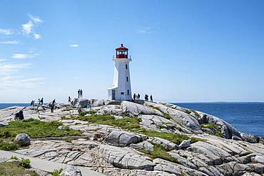 Lighthouse on granite rocks in Peggys Cove, Nova Scotia, Canada, North America