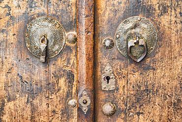 Old wooden door with door knockers, Abyaneh village, Esfahan Province, Iran, Asia