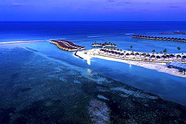 Aerial view, lagoon of a Maldives island with water bungalows, South Male Atoll, Maldives, Asia