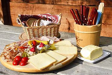 Snack plate at the Trockenbachalm, Kelchsau, Kitzbuehel Alps, Tyrol, Austria, Europe