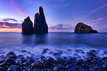 Volcanic rock formation Ilheus da Rib, steep coast of Ribeira de Janela, also Ribeira da Janela, blue hour, sunset, Porto Moniz, island Madeira, Portugal, Europe