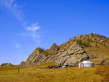 Yurt under rocks in Gorchi Terelj National Park, Ulan Bator, Mongolia, Asia