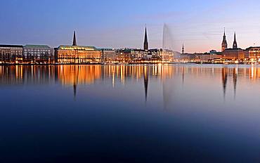 Inner Alster Lake with Alster fountain at dusk, Hamburg, Germany, Europe