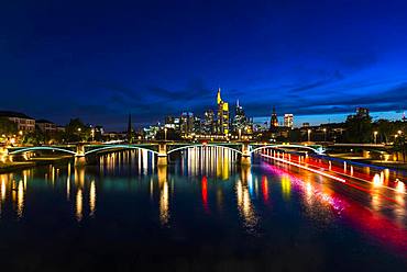 Illuminated Skyline and Ignatz Bubis Bridge at Blue Hour, City Centre, Frankfurt am Main, Hesse, Germany, Europe