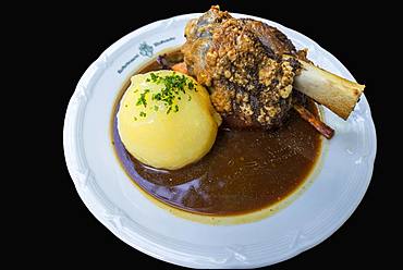 Oven-fresh Schaeuferle, knuckle of pork with potato dumpling, Bavaria, Germany, Europe