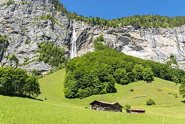 Rock face with Staubbach Falls, Lauterbrunnen Valley, Lauterbrunnen, Bernese Oberland, Switzerland, Europe