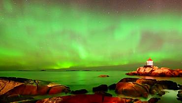 Northern Lights (Aurora borealis) above lighthouse, Eggum, Vestvagoy, Lofoten, Norway, Europe