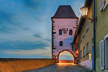 Hagenbachturm illuminated at dusk, Breisach am Rhein, Baden-Wuerttemberg, Germany, Europe