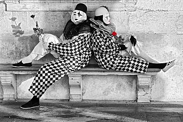 Pierrot, sitting on stone bench, rose coloured, Venice, Italy, Europe