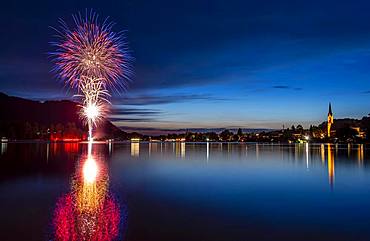 Fireworks, reflection in Lake Schliersee, St. Sixtus Parish Church, Schliersee, Upper Bavaria, Bavaria, Germany, Europe