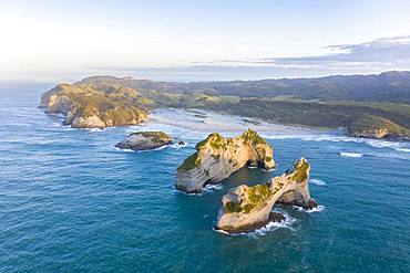 Rock island on Wharariki beach, Wharariki Beach, Golden Bay, Southland, New Zealand, Oceania